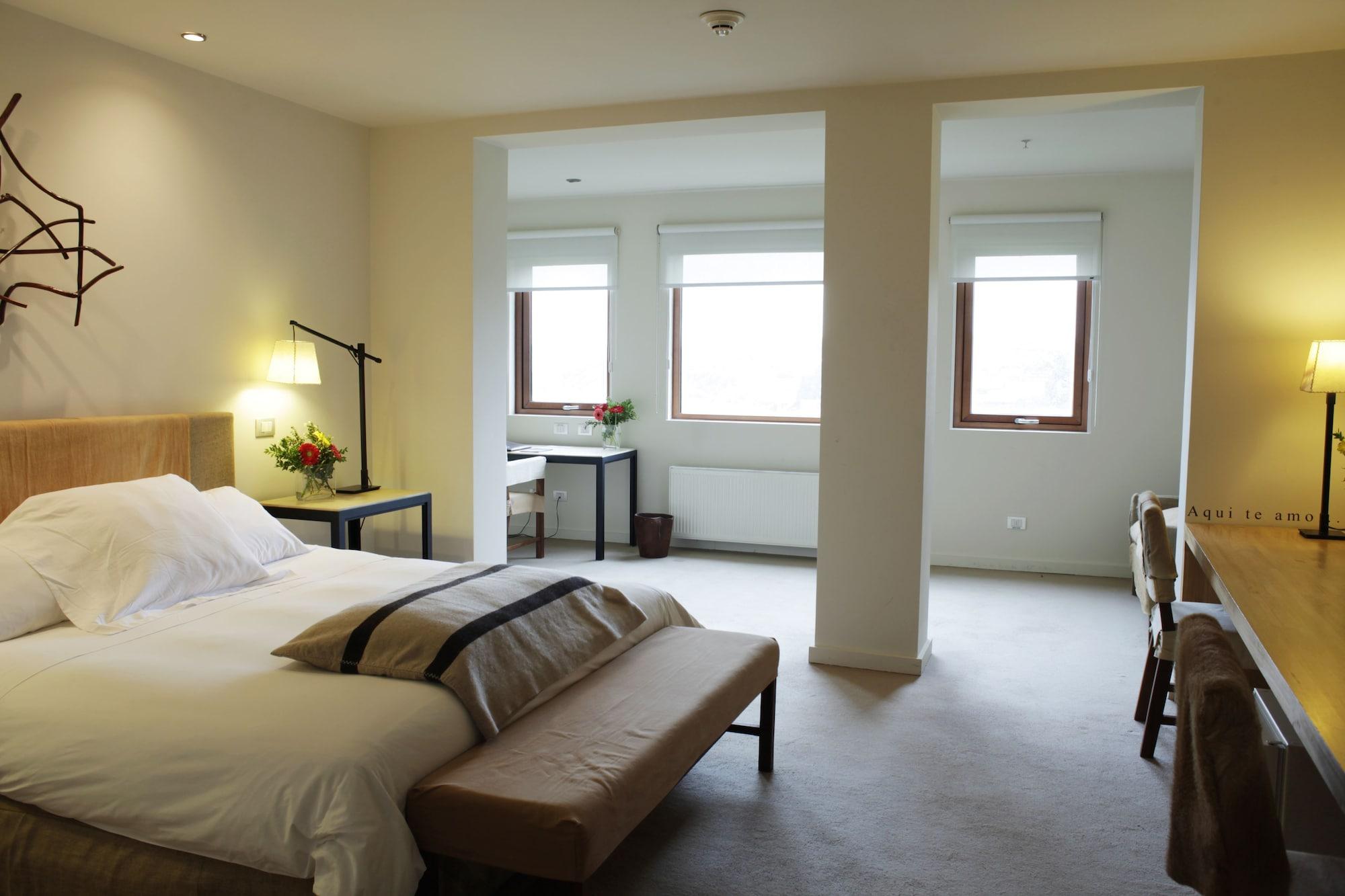 Enjoy Puerto Varas Buitenkant foto A room at the Hotel de Ville
